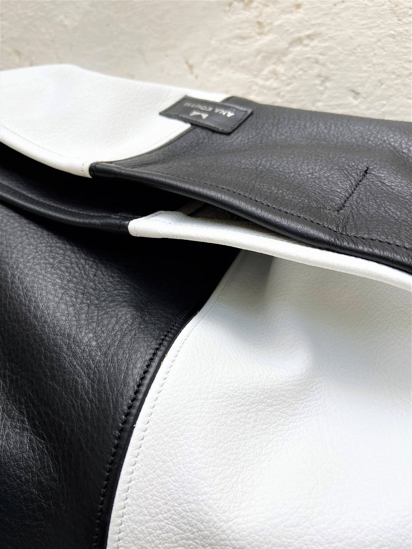 Akathi double leather bag in black & white