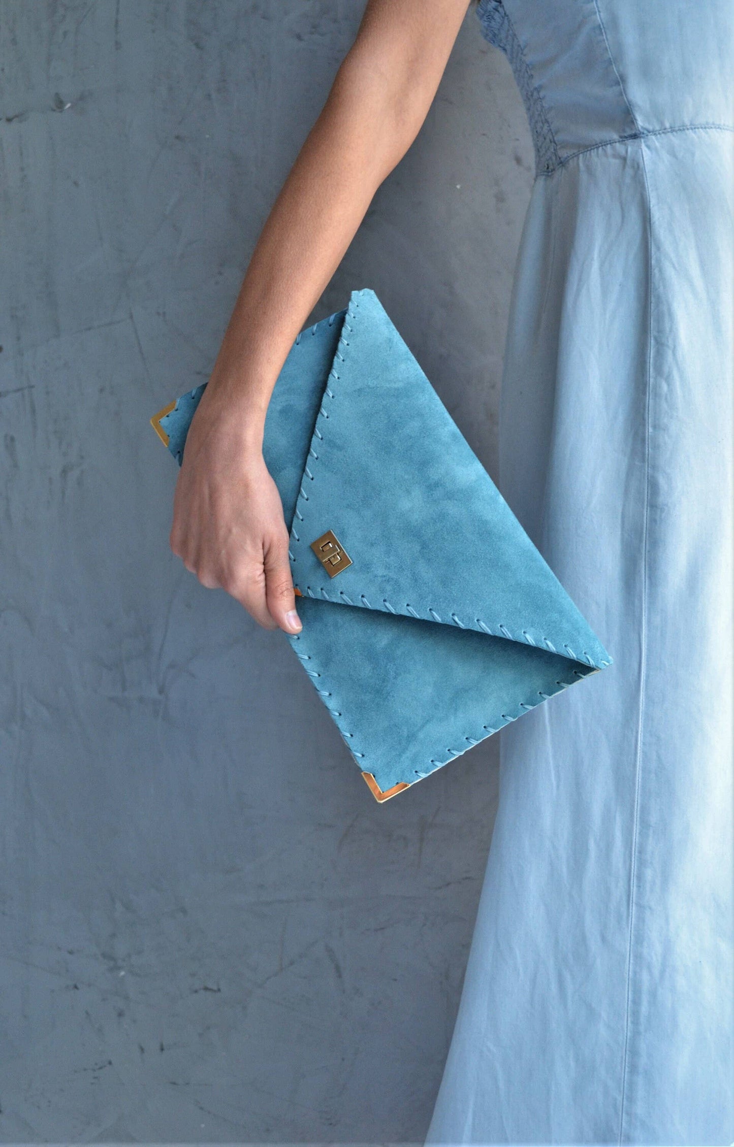 Symmetria soft clutch in jeans blue