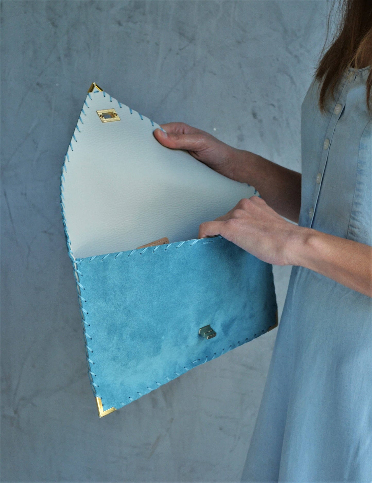 Symmetria soft clutch in jeans blue