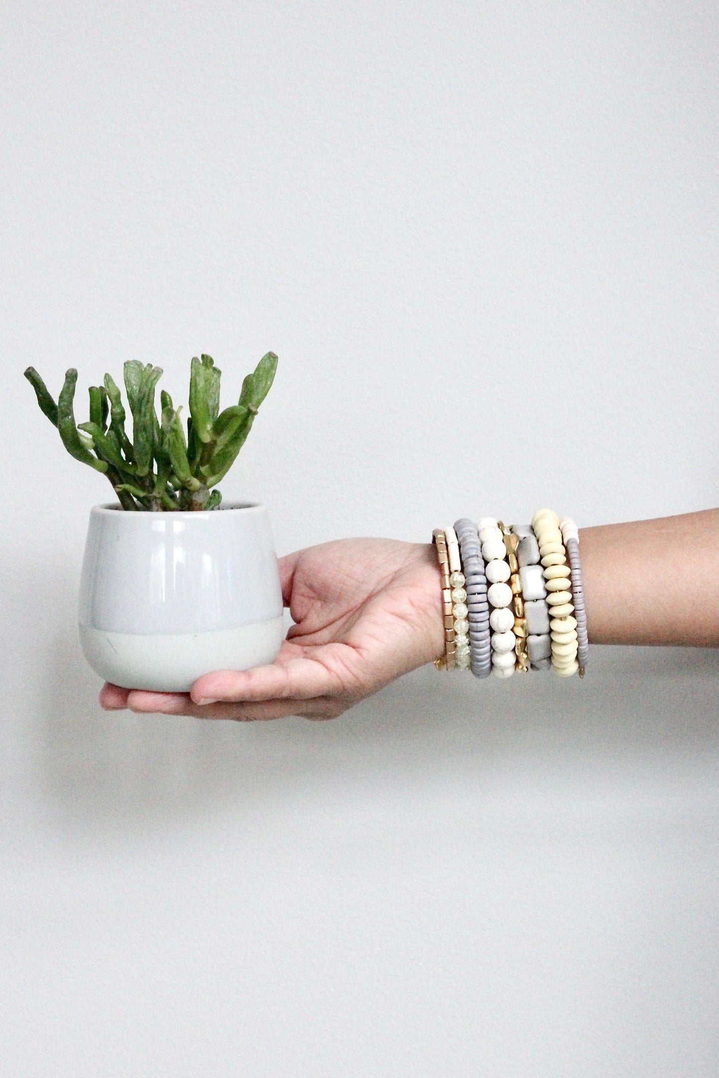 GNDB04 gray, white, and brass wrap bracelet