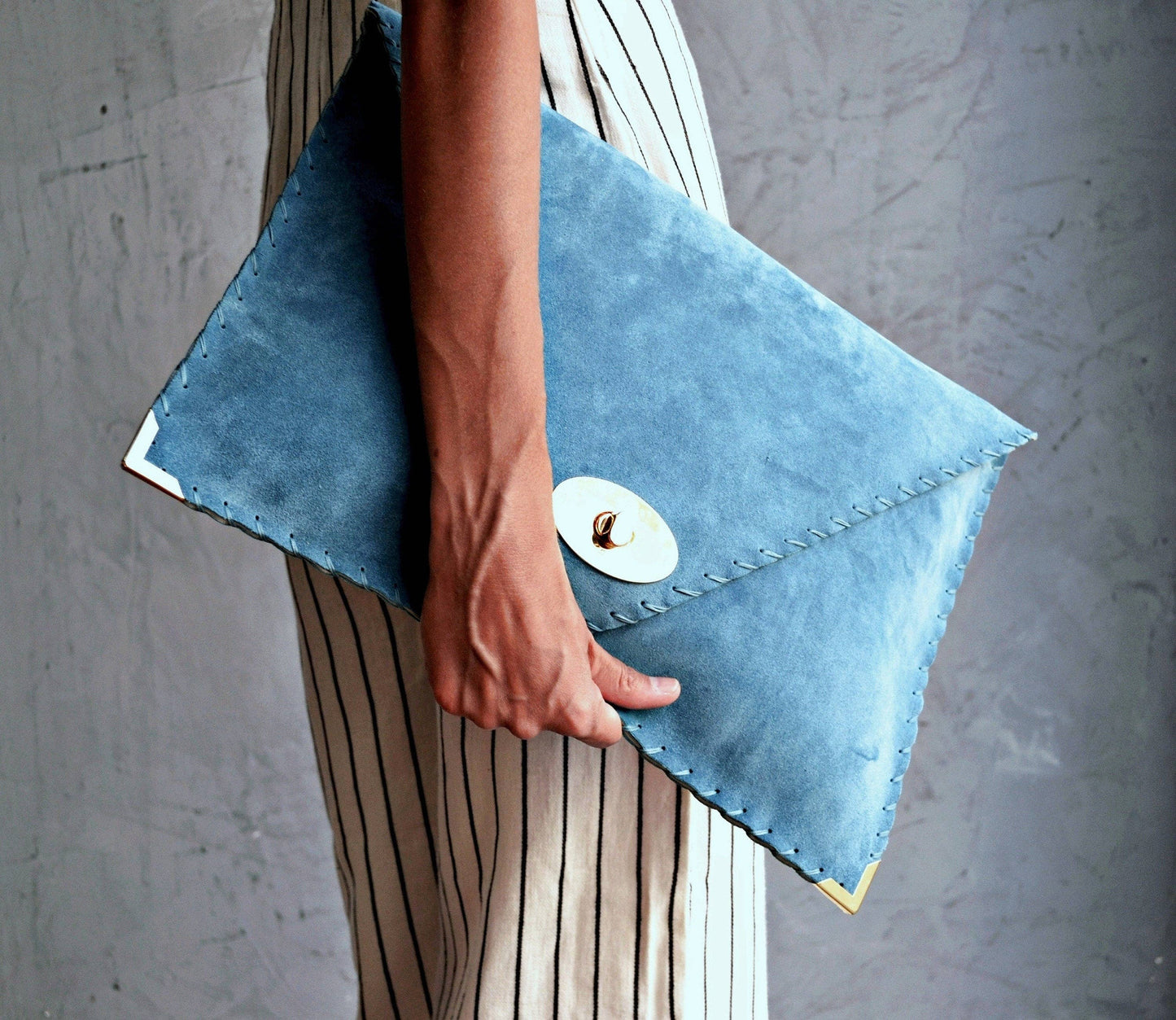 Symmetria soft clutch in jeans blue