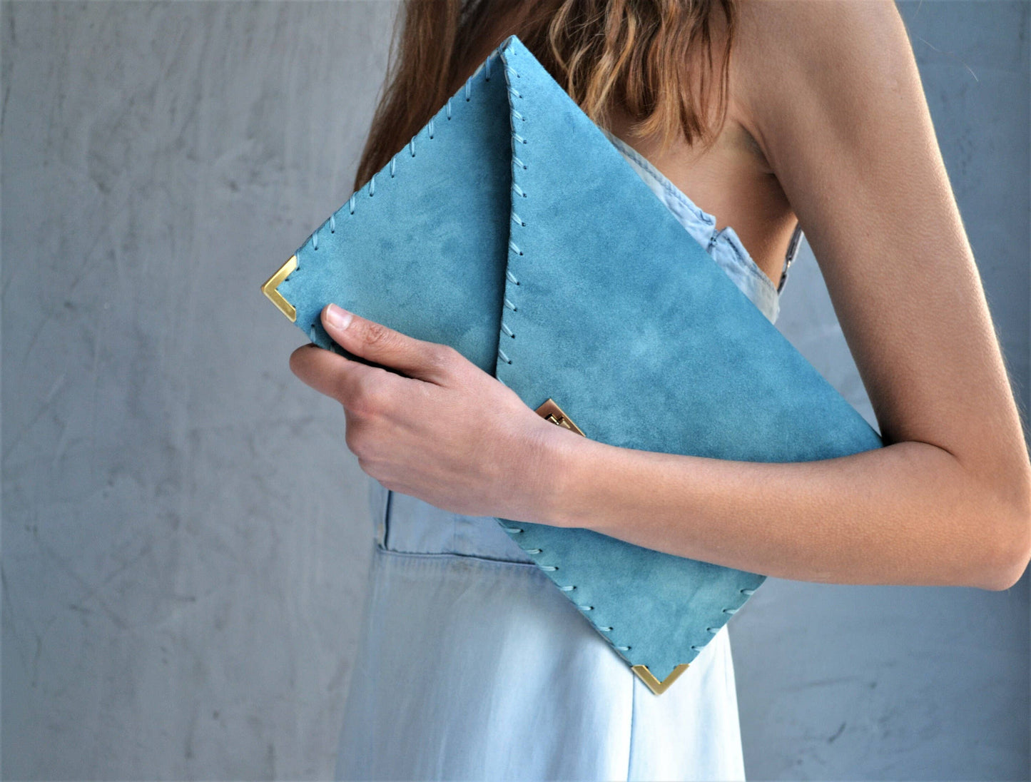 Symmetria soft clutch in jeans blue