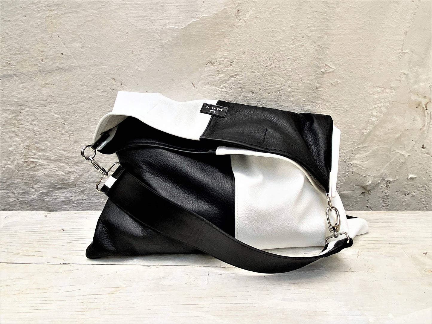 Akathi double leather bag in black & white