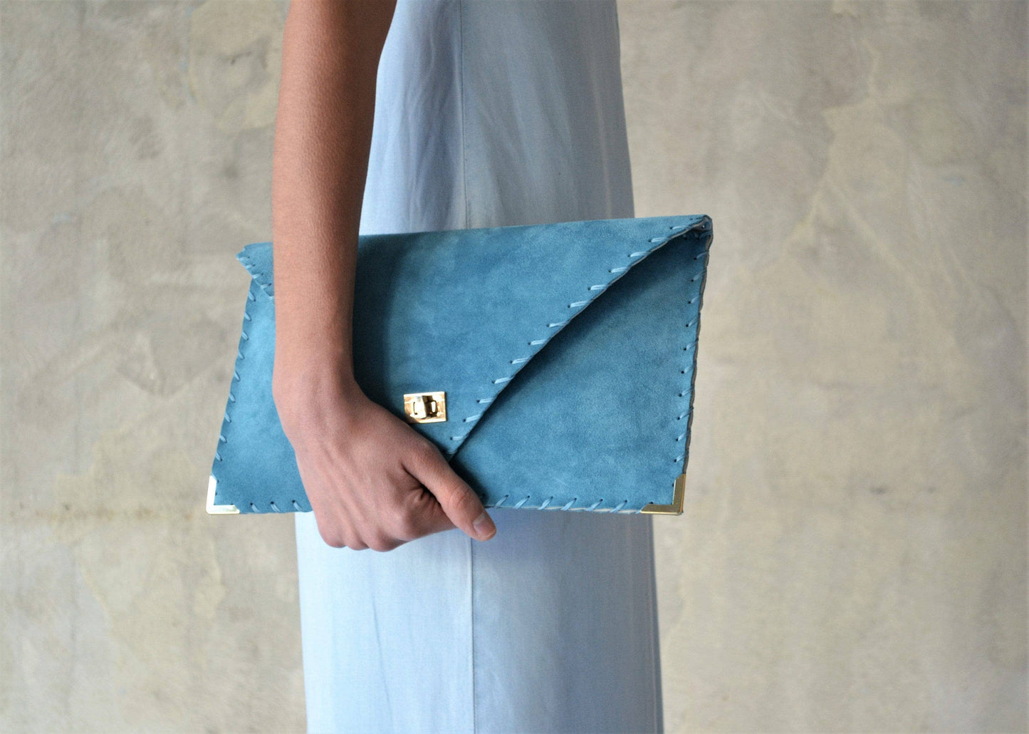 Symmetria soft clutch in jeans blue