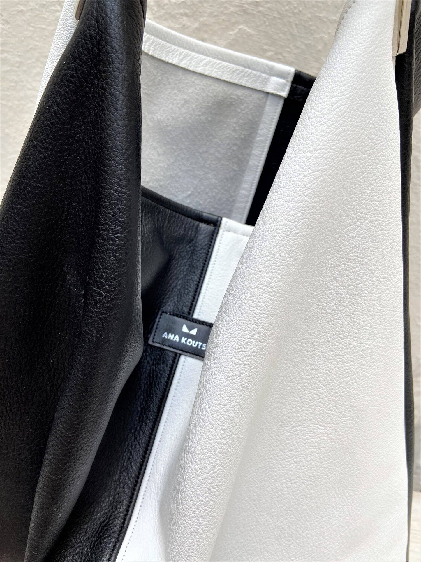 Akathi double leather bag in black & white