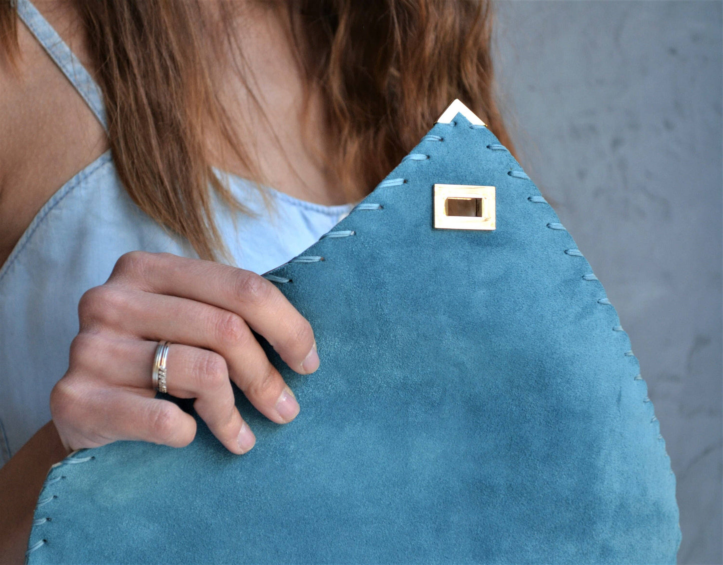 Symmetria soft clutch in jeans blue